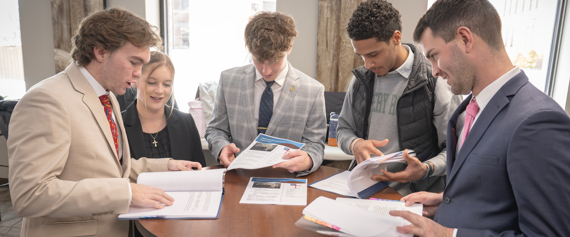 business students discussing a group project