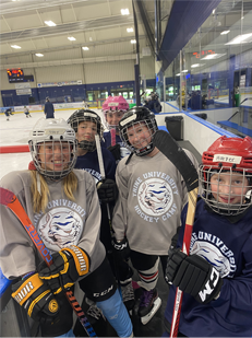 Kids learning hockey