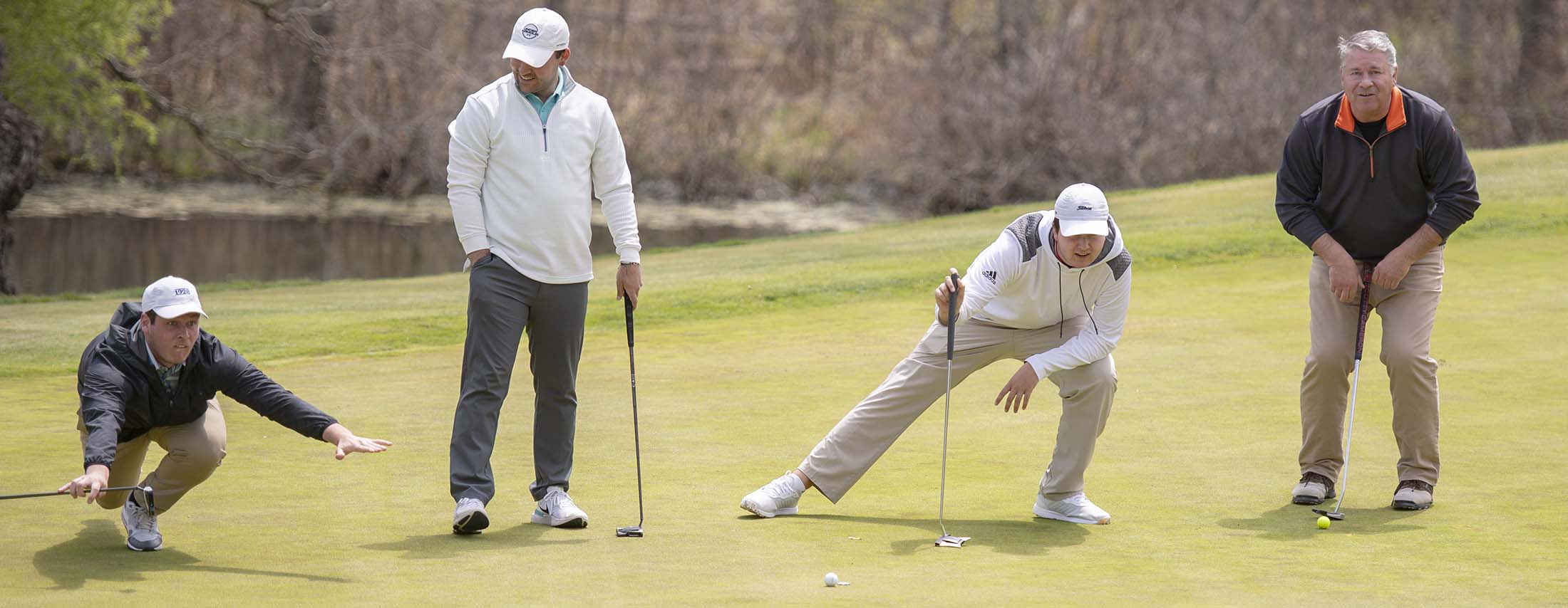 Four golfers