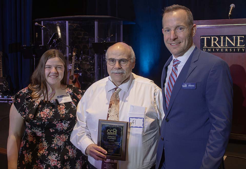 Prof. Al Beatty, distinguished faculty, with Samantha Kopach and Travis Wilhelm