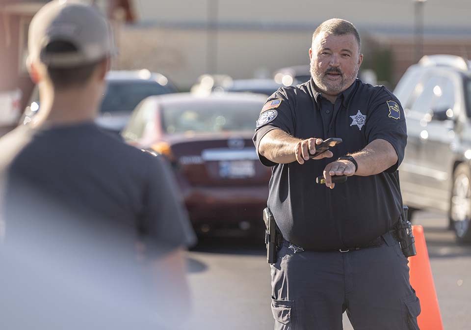 Police officer explaining drone operation