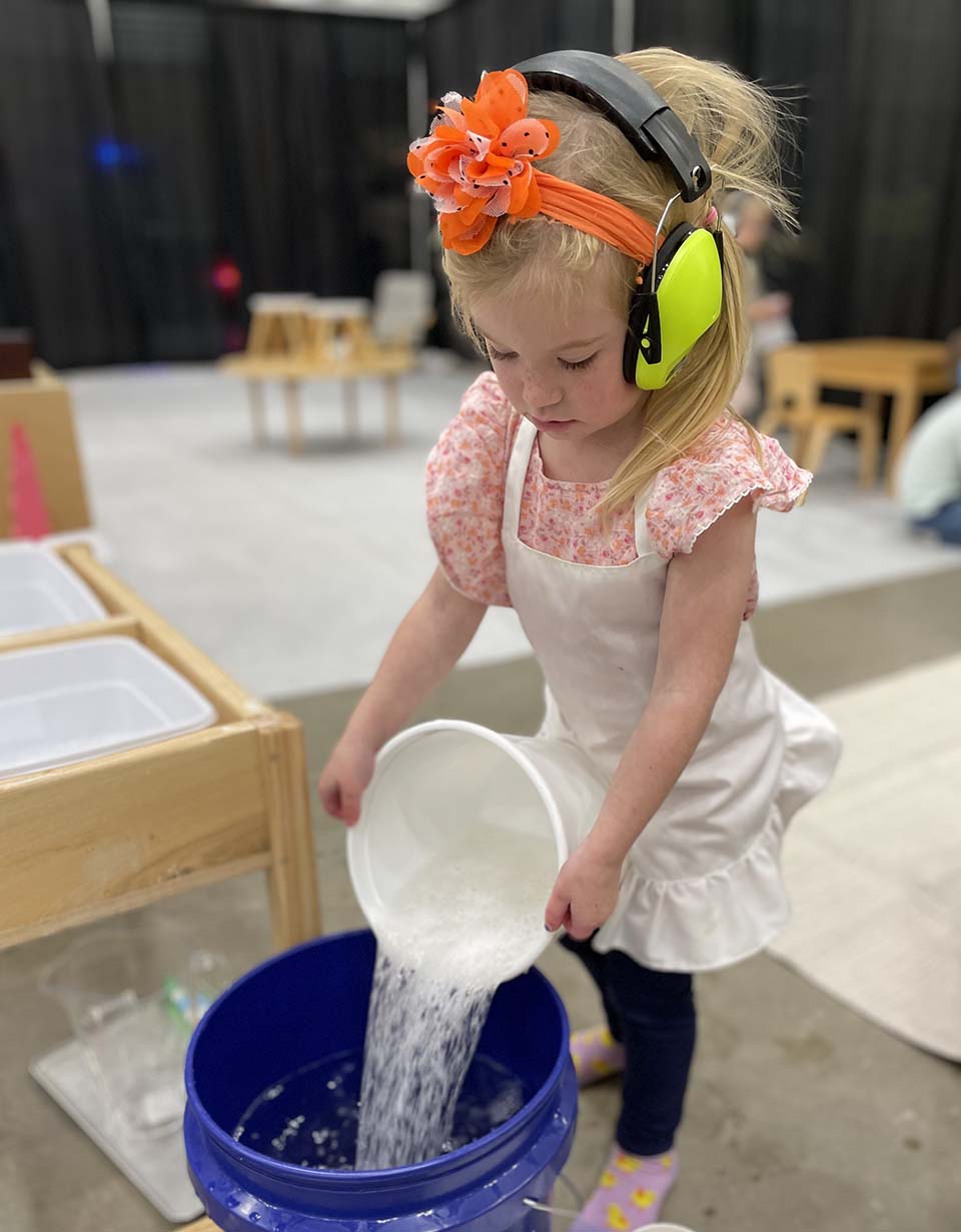 Child pouring water
