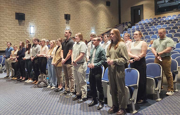 Students standing in Fabiani Theatre