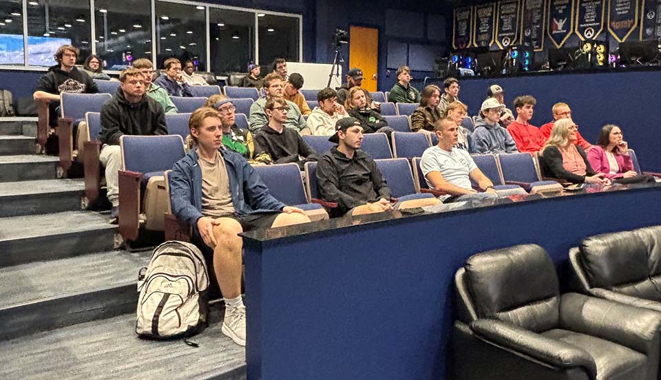 Students seated in arena
