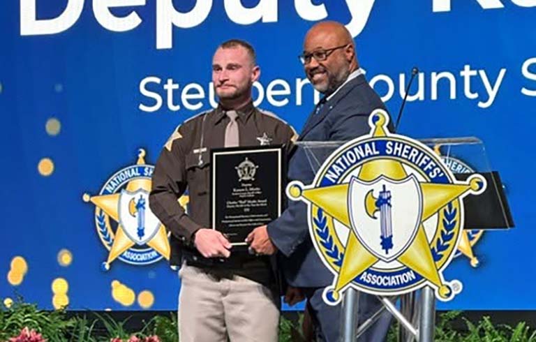 Deputy Karson Meeks receiving award