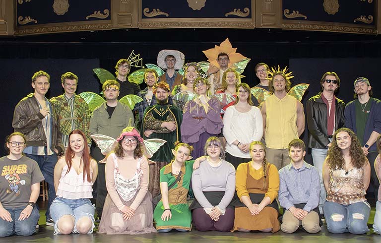 Midsummer Jersey cast on stage in costume