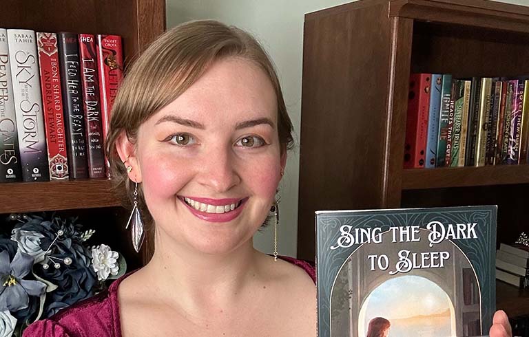 Mycah Houser with Sing The Dark To Sleep book