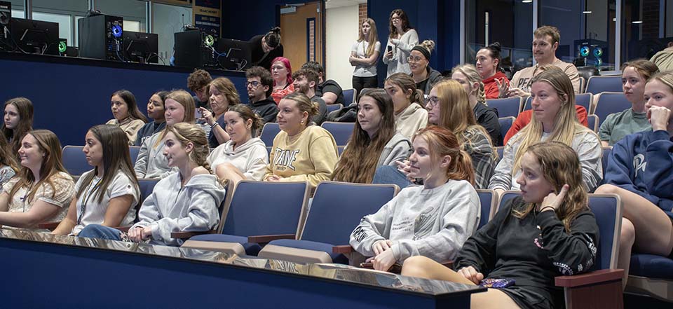Students in arena seating
