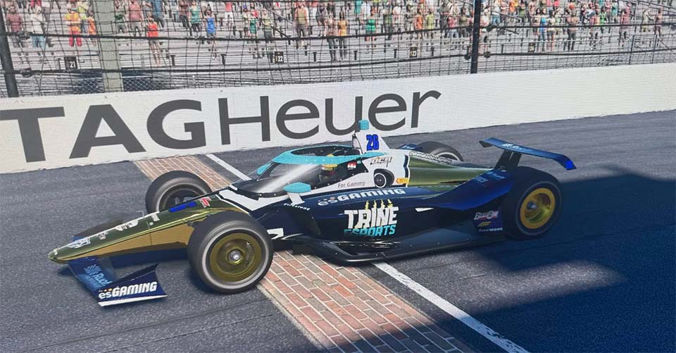 Indy car crossing finish line