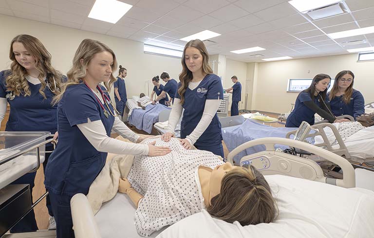Trine University nursing students practicing skills at Cameron Health